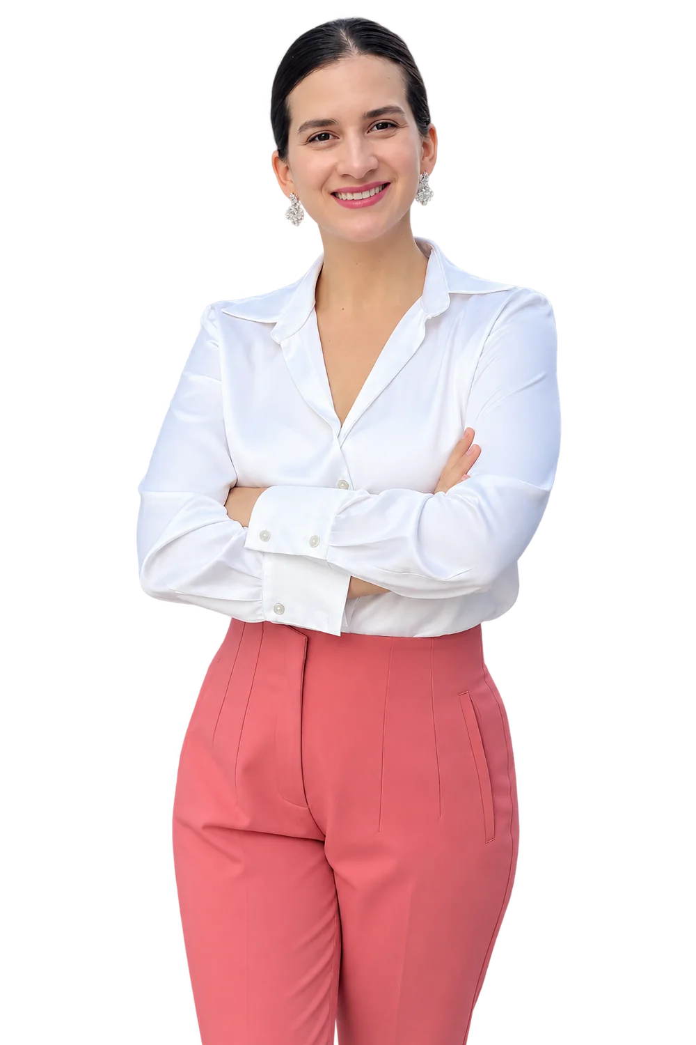Cristina, neuroeducadora, sonriendo con los brazos cruzados